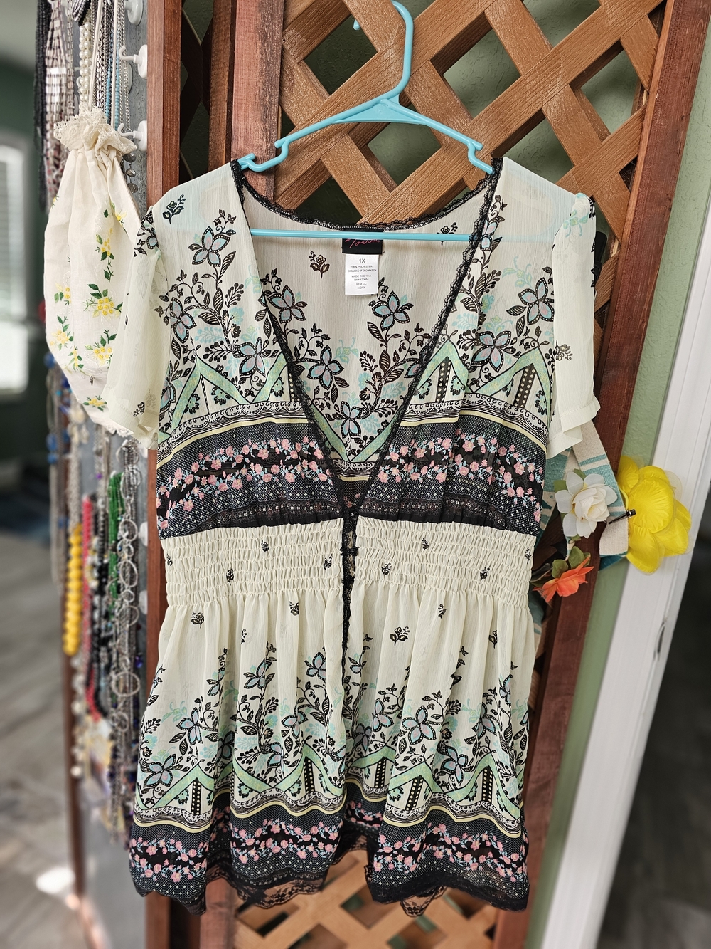 torrid Cream Floral V‑Neck Peplum Tunic with Black & Mint Details